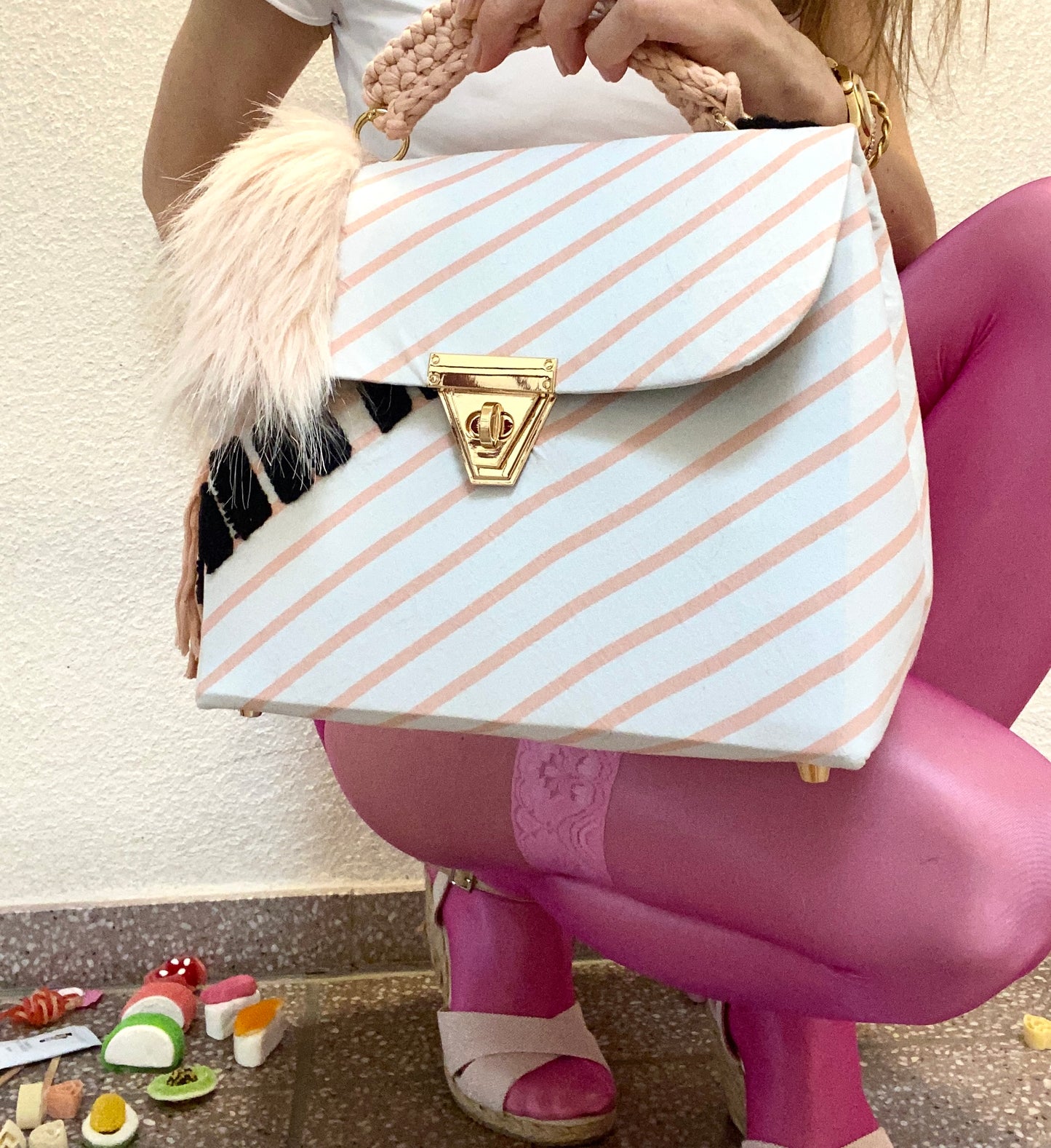A SIGNATURE STRIPED RITZY HAZE BAG
