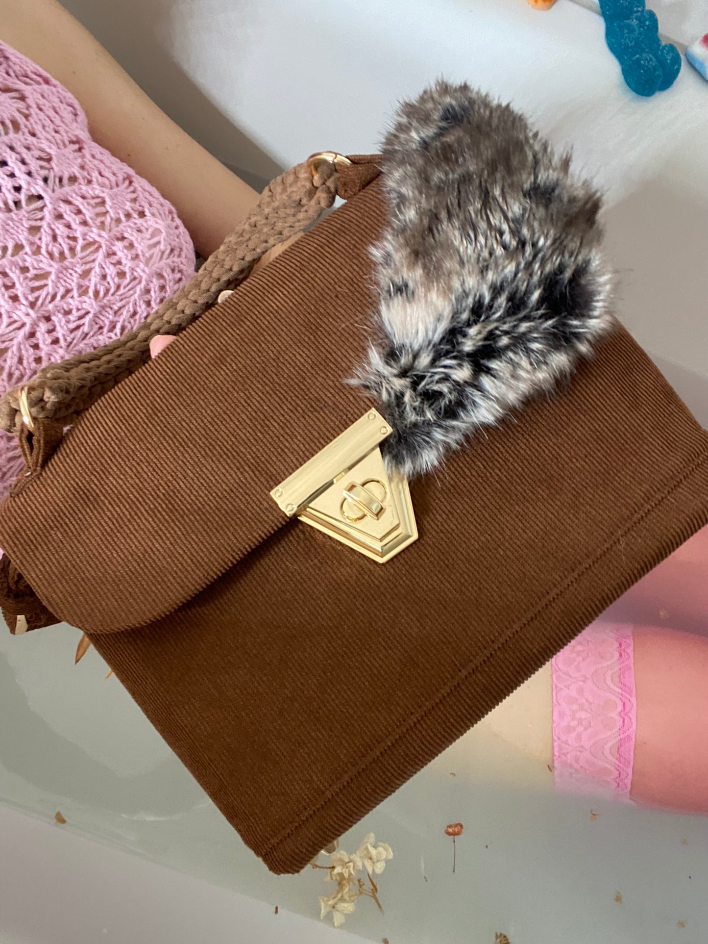 A SIGNATURE CHARLY BROWN CORDUROY BAG