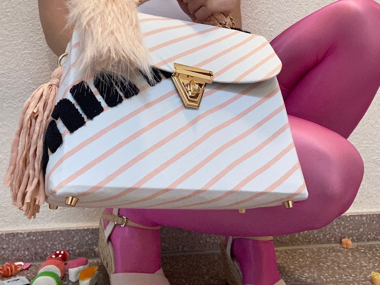 A SIGNATURE STRIPED RITZY HAZE BAG