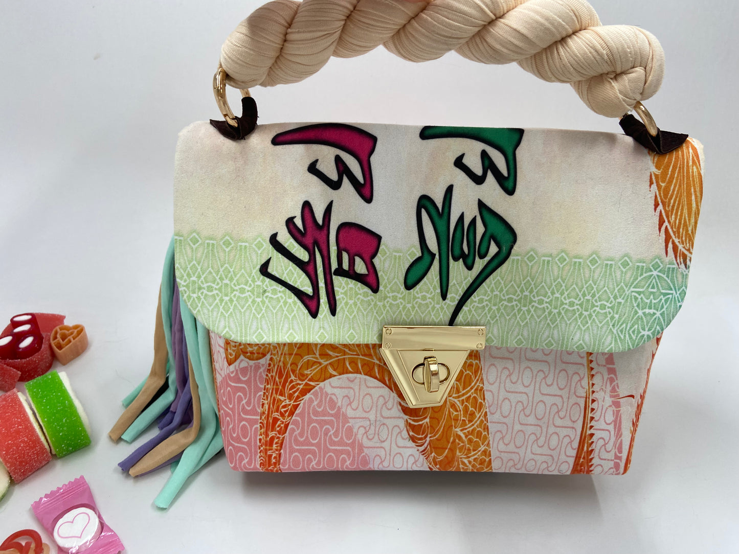 A SIGNATURE DRAGON RAINBOW BAG