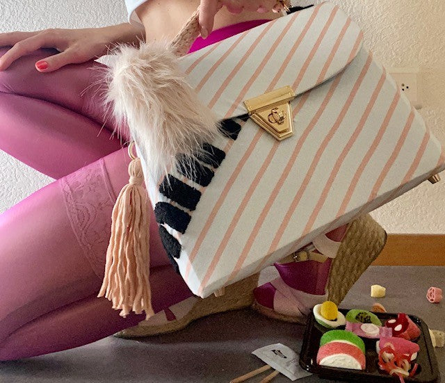 A SIGNATURE STRIPED RITZY HAZE BAG