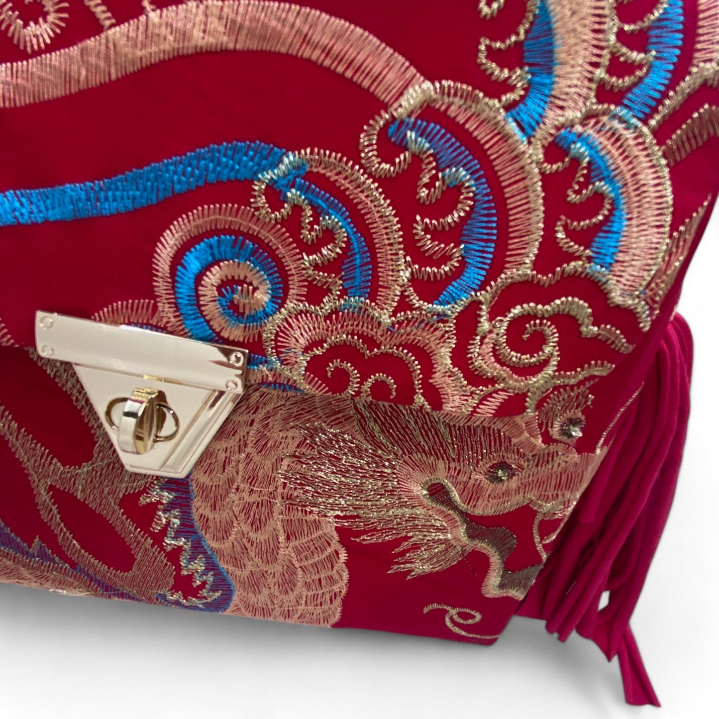 A SIGNATURE GOLDEN EMBROIDERED PHOENIX BAG