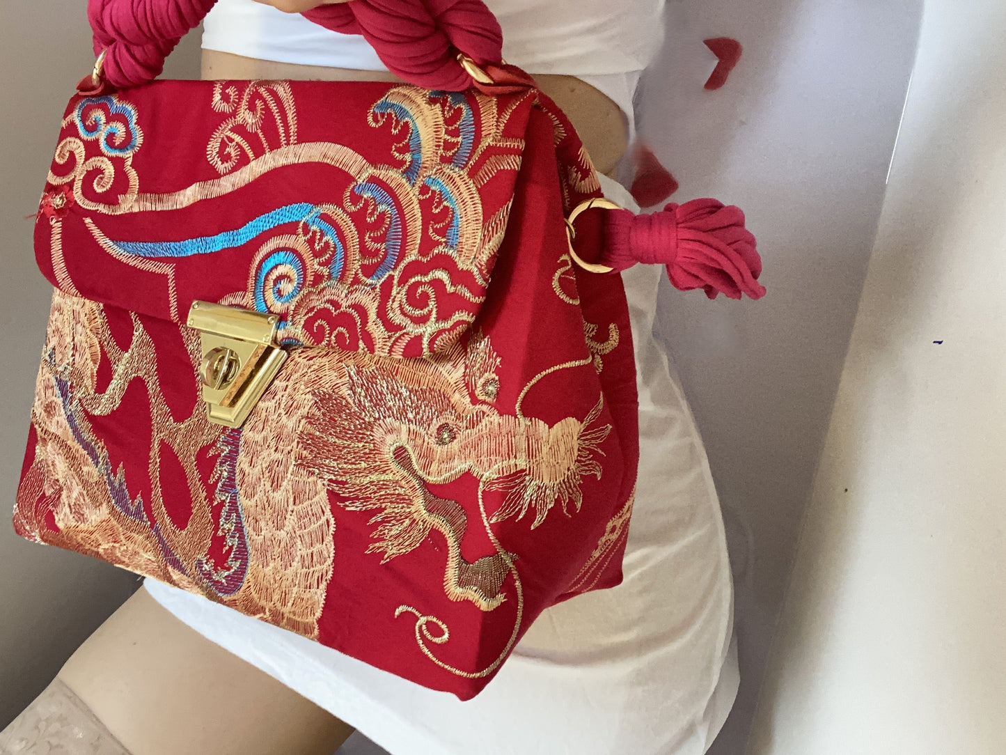 A SIGNATURE GOLDEN EMBROIDERED PHOENIX BAG