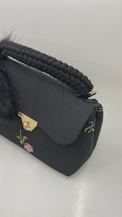 A Signature Classic Black Venom Bag