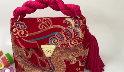 A Signature Golden Embroidered Phoenix Bag